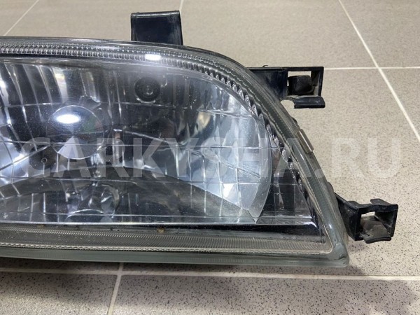 Фара передняя правая Toyota Tercel 1999 г Toyota Tercel оригинальный номер 16158