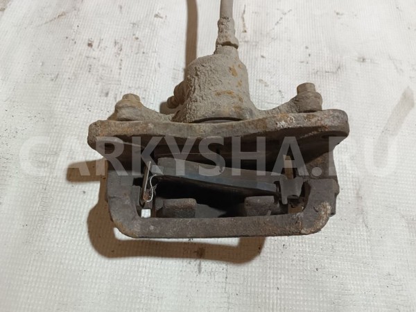 Суппорт тормозной задний левый Mitsubishi Diamante оригинальный номер MB950351