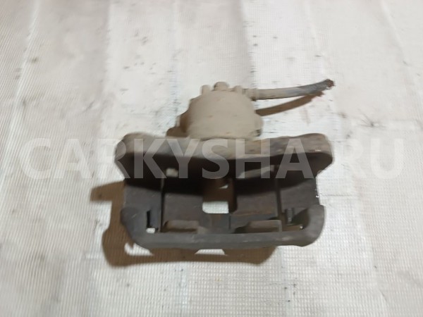 Суппорт тормозной передний левый Mitsubishi Dingo оригинальный номер MR569125