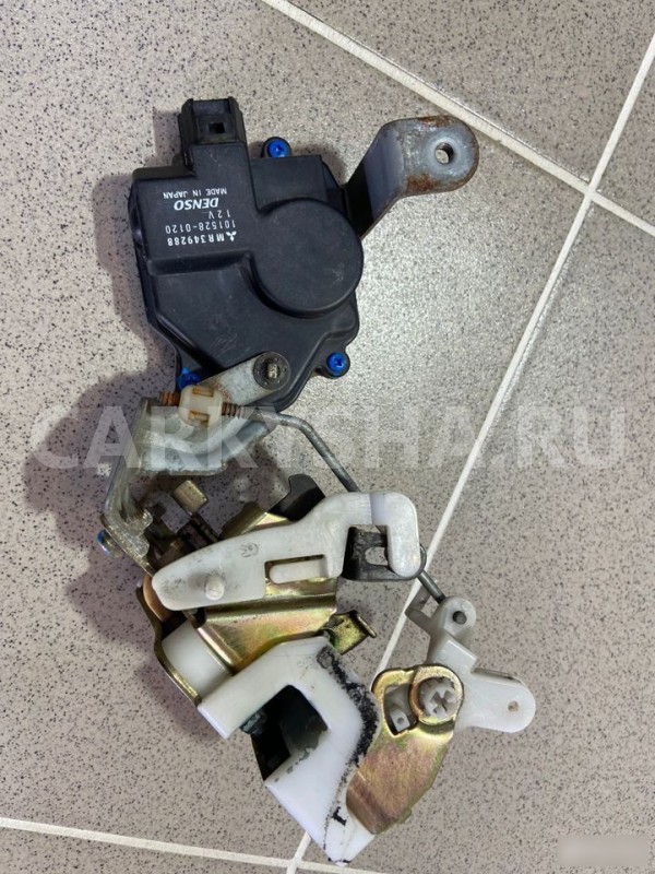 Замок двери задний правый Mitsubishi Mirage Dingo Mitsubishi Dingo 