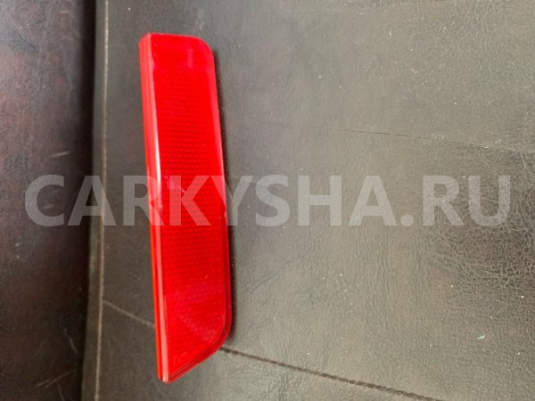 Катафот заднего бампера правый Renault Duster I Renault 15 оригинальный номер RNL0579315R