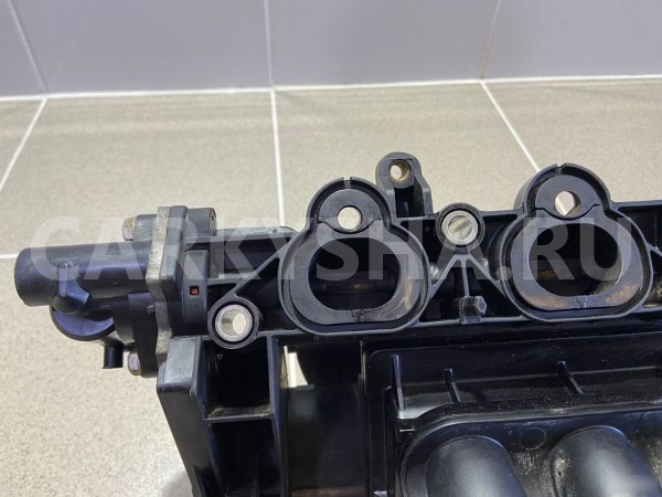 Коллектор впускной Mazda Demio 2005 г Mazda 2 оригинальный номер 0998000132
