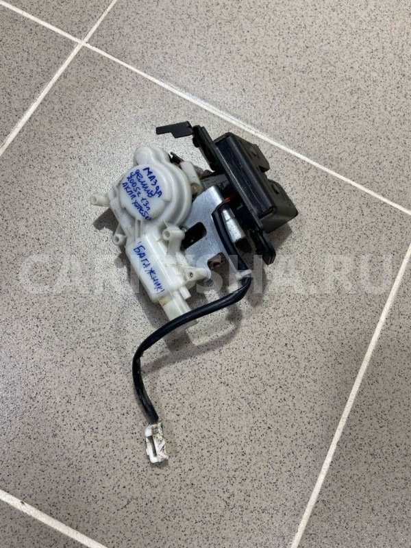 Замок багажника Mazda Demio 2005 г Mazda 2 оригинальный номер B6701