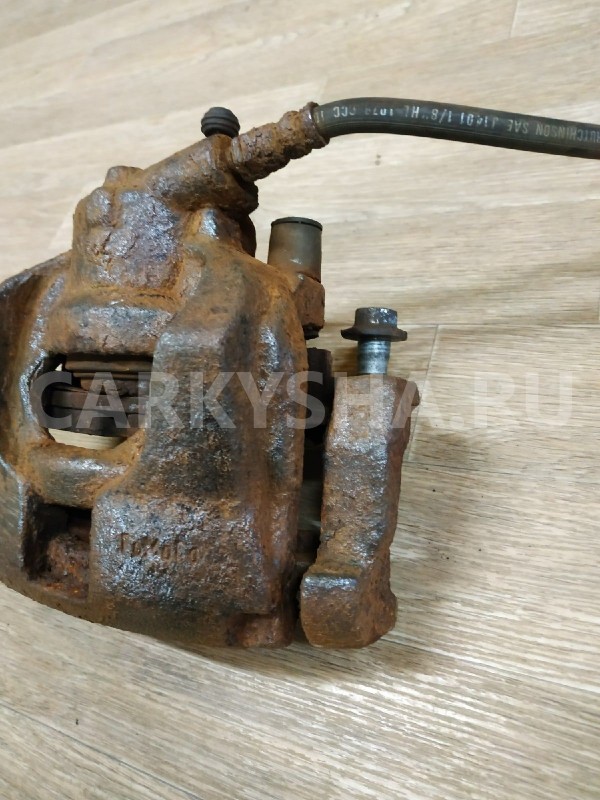 Суппорт тормозной передний левый Land Rover Freelander оригинальный номер 1583140