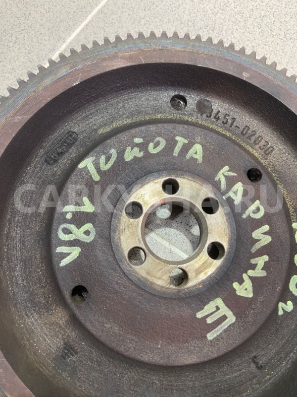 Маховик Toyota Carina E 1996 г 7A-FE МКПП Toyota Carina оригинальный номер 1345102030