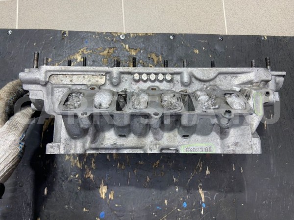 Головка блока цилиндров левая Audi A6 C5 AKN 2000 Audi 200 оригинальный номер 0591033730