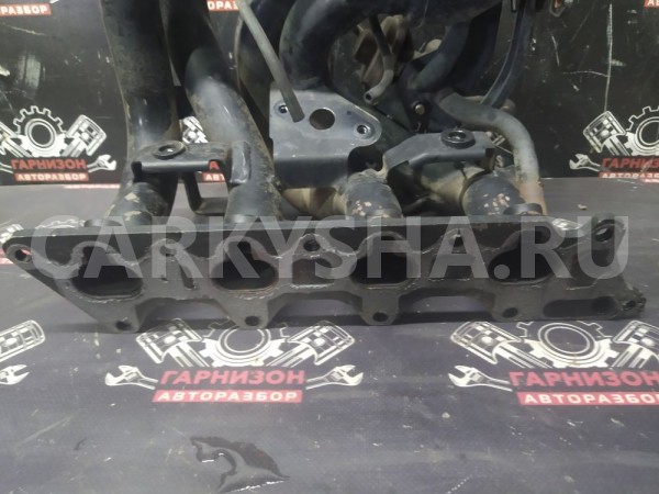 Впускной коллектор 4G18 Mitsubishi Lancer 9 2006г Mitsubishi i оригинальный номер 1540A001